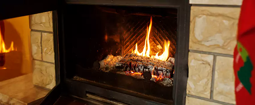 Commercial Prefabricated Fireplace Replacement in Normandie, Quebec