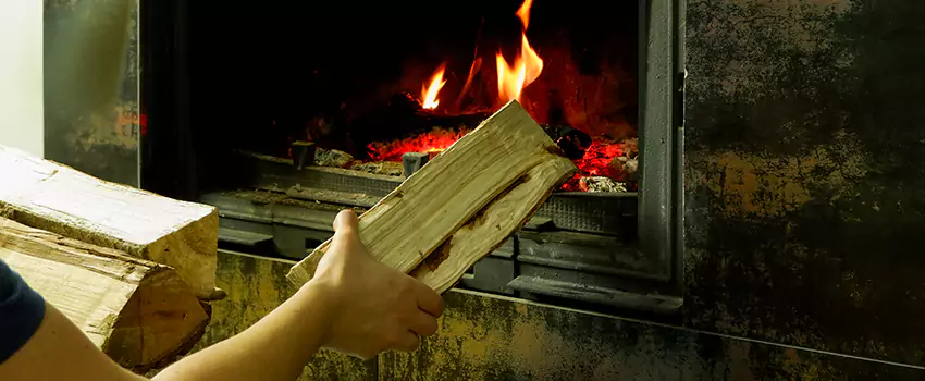 Wood Stove Heat Resistant Wall Repair in Normandie, Quebec